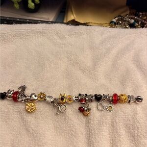 Linx bracelet with dog and flower charms